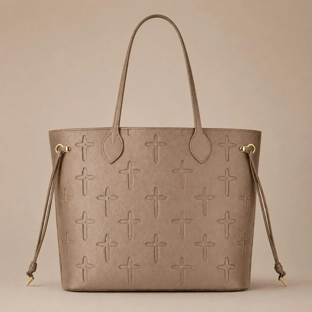Embossed cross details on the Selah Tote